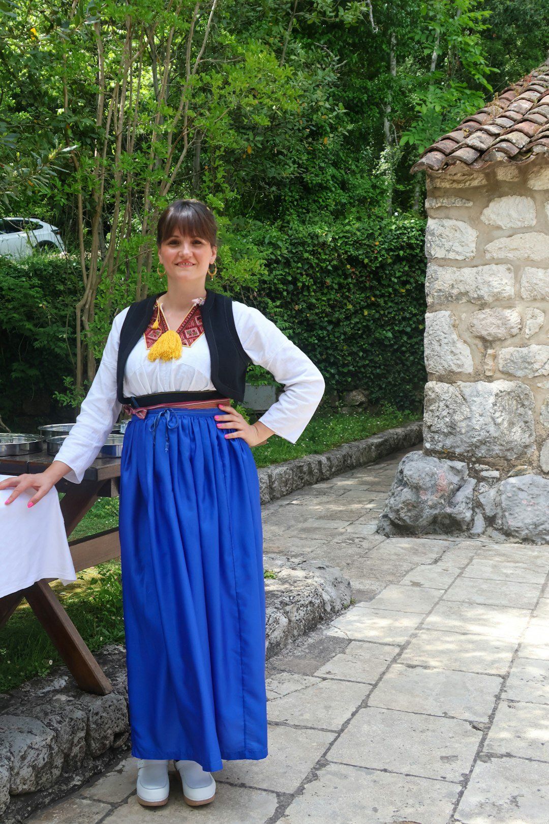 Elderly Croatian woman in traditional dress in a Zagora village home